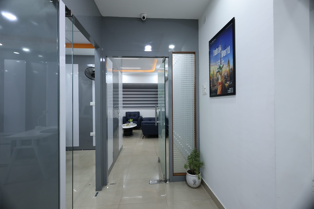 Solutions1313 office interior with glass cabins and Dubai branch branding